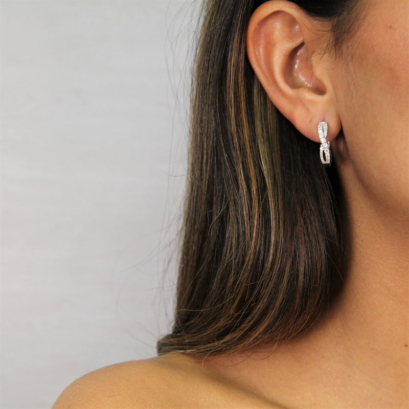 Diamond Infinity Twist Hoop Earrings, 0.65 ct - R&R Jewelers 