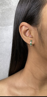 Shared Prong Diamond and Emerald Huggie Earrings - R&R Jewelers 